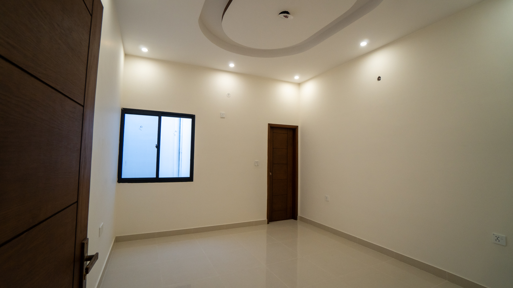 Villas exterior shaded by mature trees